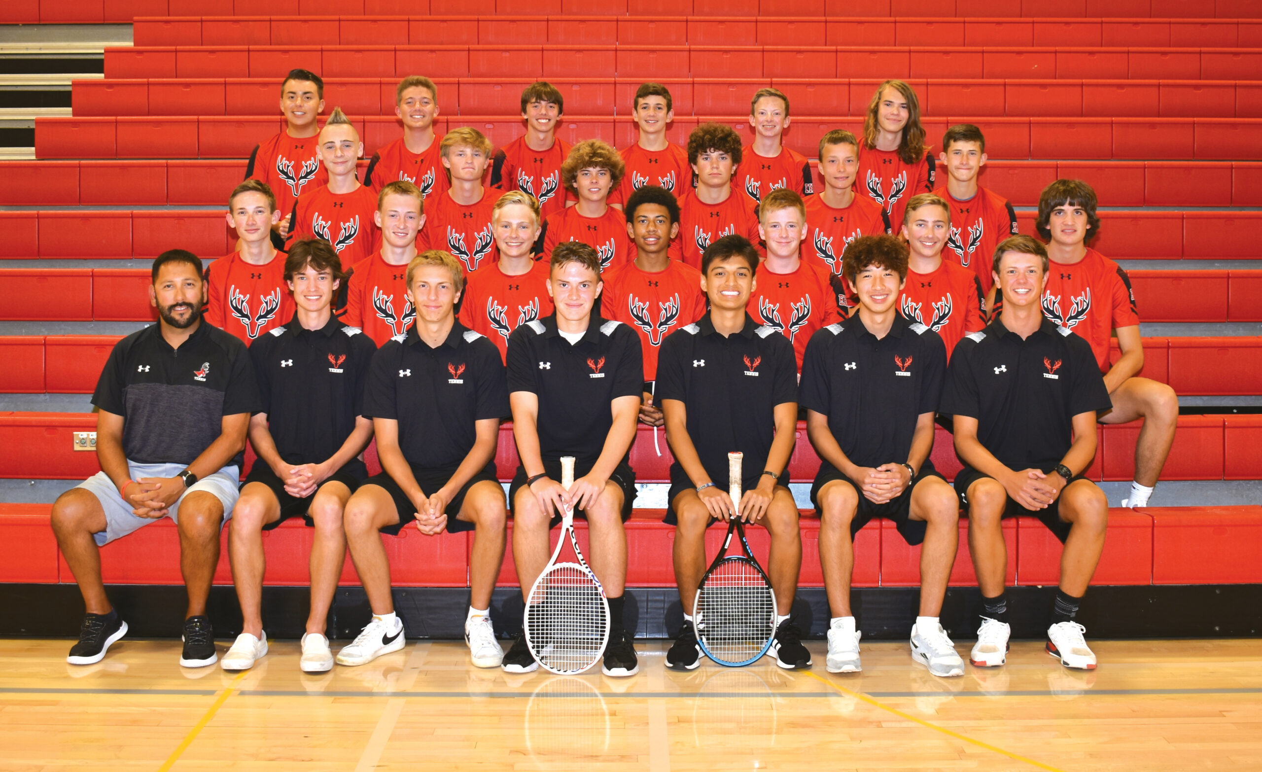 Photo of all boys tennis team members