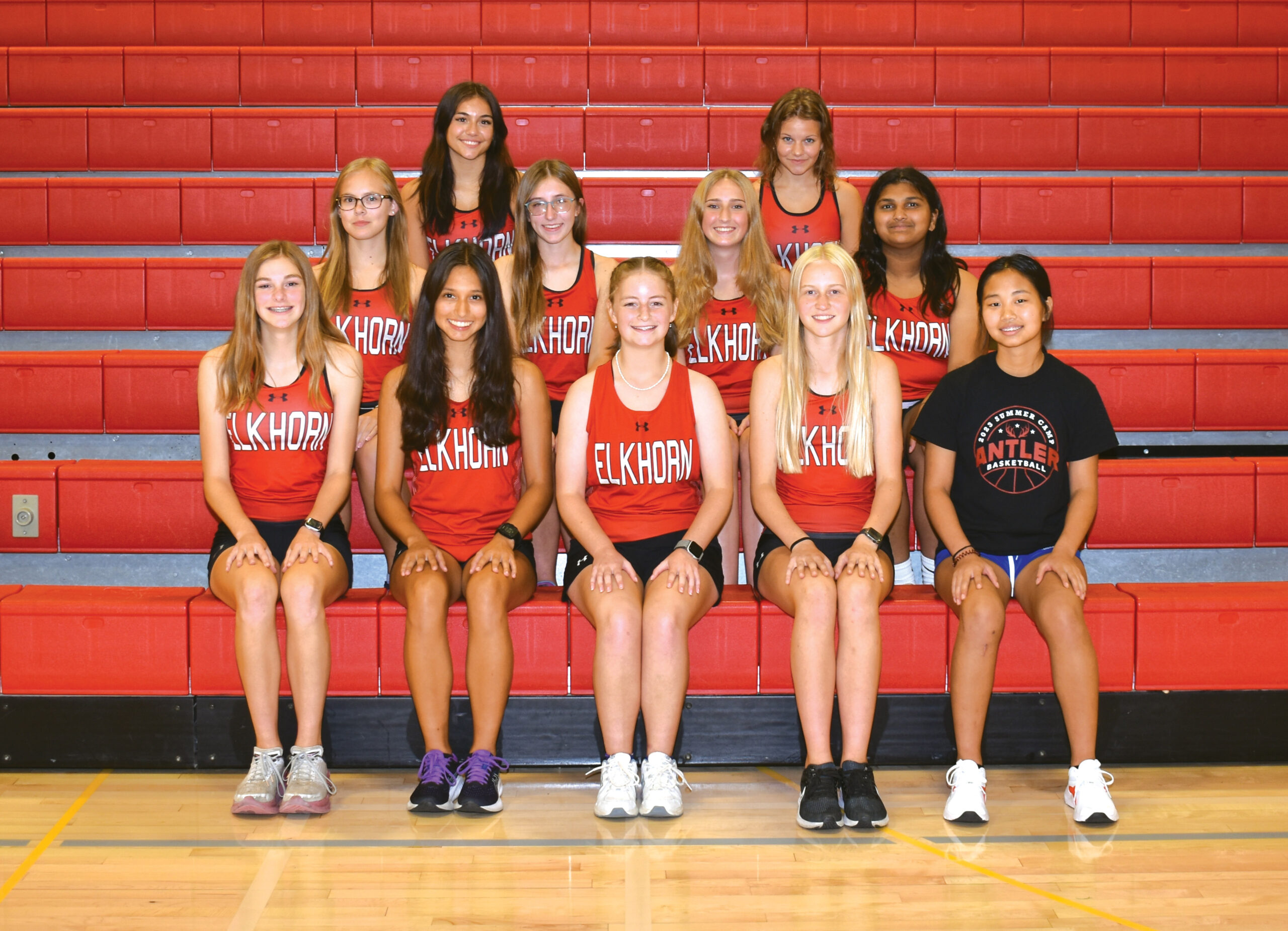 Photo of all girls cross country team members