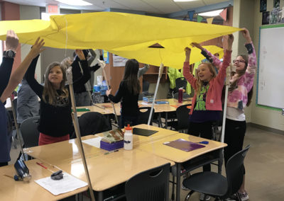 These students transformed desks into a covered wagon