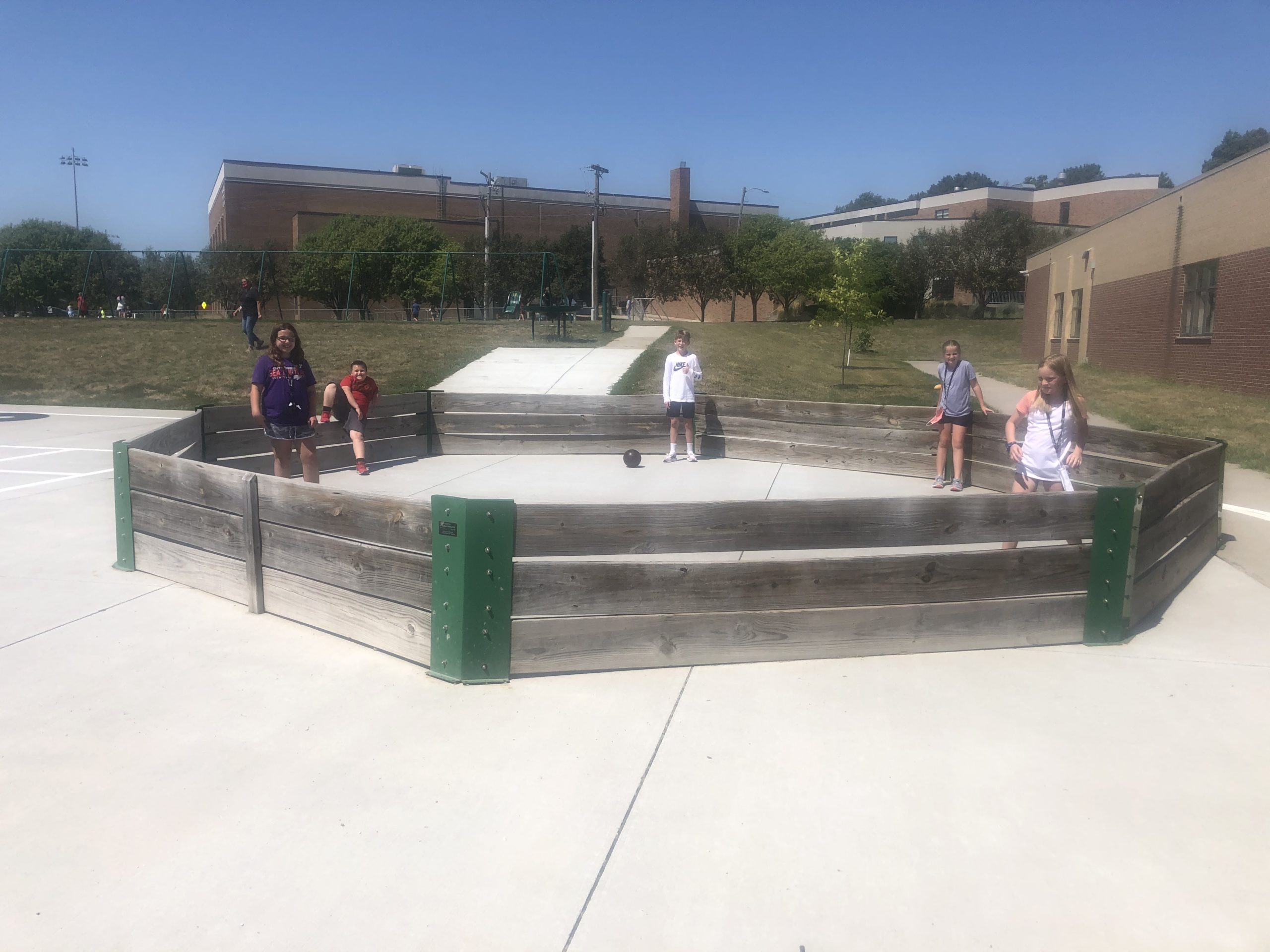 Students in gaga ball pit