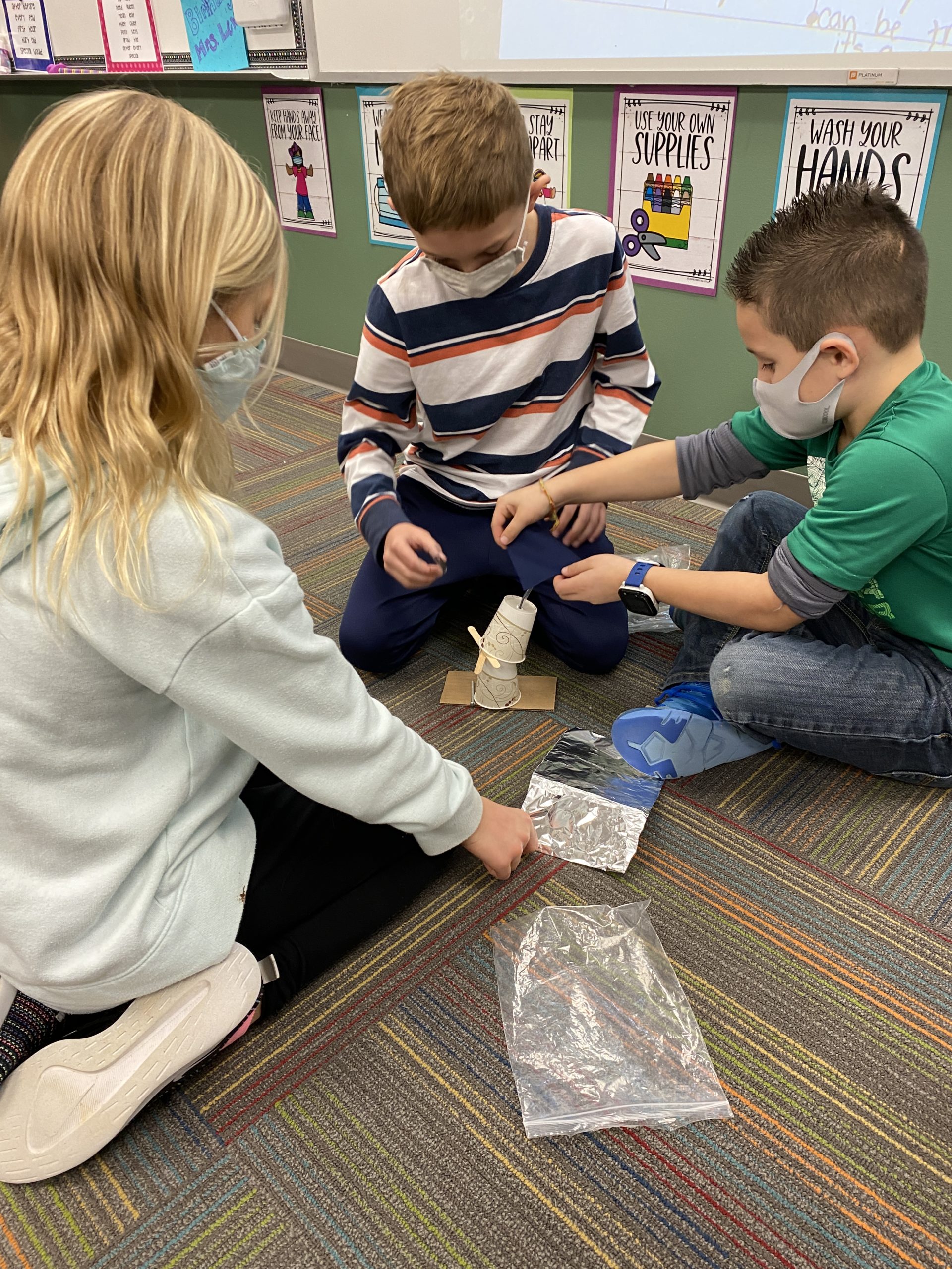 Students building tower