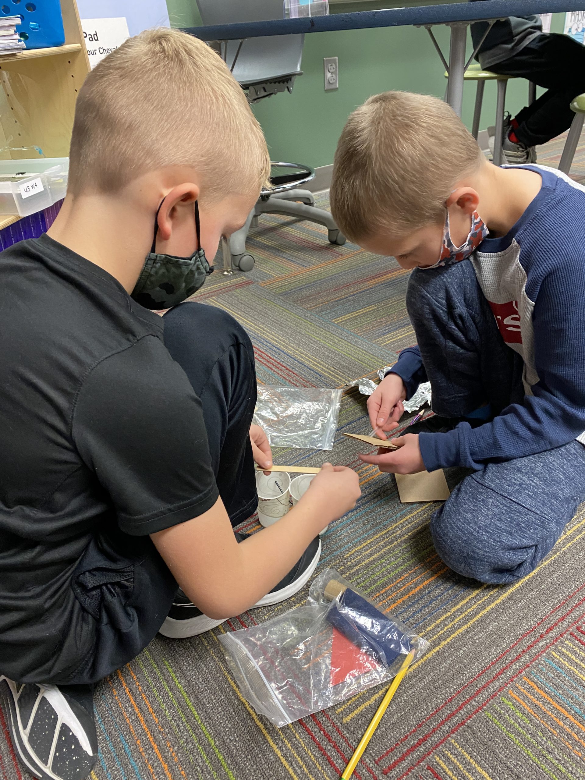 Students building tower