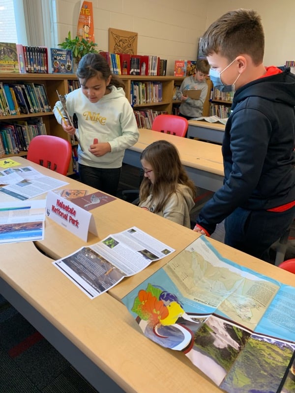 Students researching national parks