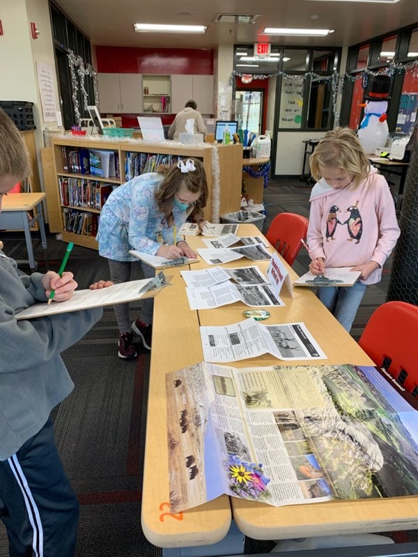 Students researching national parks