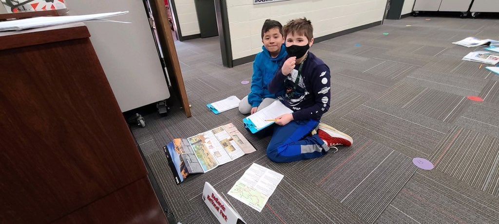 Students researching national parks